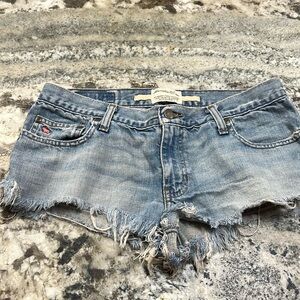 Hard to find low rise Distressed Abercrombie cut off shorts.